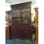 An Edwardian Mahogany Astragal Glazed Library Bookcase.