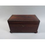 A Mid 19th Century Rosewood Two Division Tea Caddy with Centre Glass Mixing Bowl.