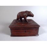 A 19th Century Black Forest Carved Linden Wood Trinket Box, The Top Decorated with a Carved Bear.