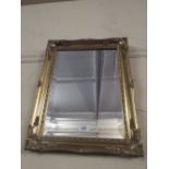 A Modern Gilt Framed Wall Mirror 49x39xm