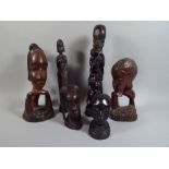 A Collection of Six Carved Wooden African Tribal Figures and Busts.