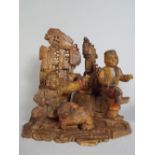 A 19th Century Chinese Carved Soapstone Group of Two Martial Artists in a Stone Grotto.