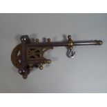 A 19th Century Hinged Brass Mounted Steel Chimney Crane with Sliding Hook.