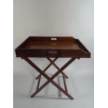 A Late 19th Century Mahogany Butlers Tray on Folding Stand.