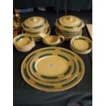 A Part Booths Green and Gold Dinner Service to Include Meat Plates, Dinner Plates, Two Tureens,