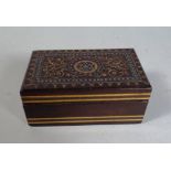 A 19th Century Anglo-Indian Box with a Wire Inlay Decoration Surrounding a Sadeli Roundel.