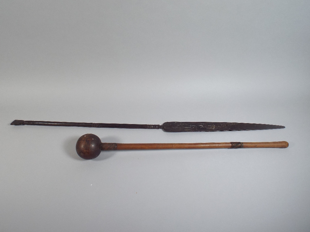 An African Tribal Club and Ceremonial Spear. 66 and 95cm Long Respectively.