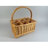 A Wicker Six Bottle Wine Carrier