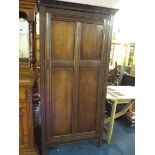 An Edwardian Oak Fitted Wardrobe with labelled compartments by Fitrobe