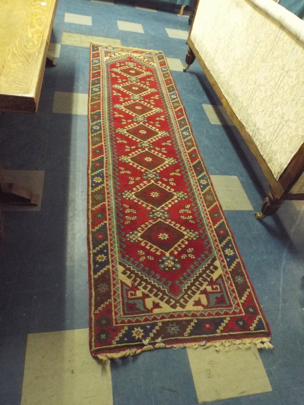 A Vintage Hand Knotted Kazak Carpet Runner.