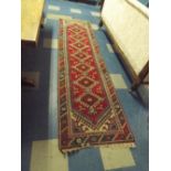 A Vintage Hand Knotted Kazak Carpet Runner.