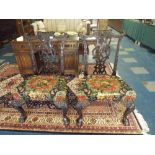 A Pair of Good Chippendale Style Chairs Blind Carved with Flowers and Acorns.