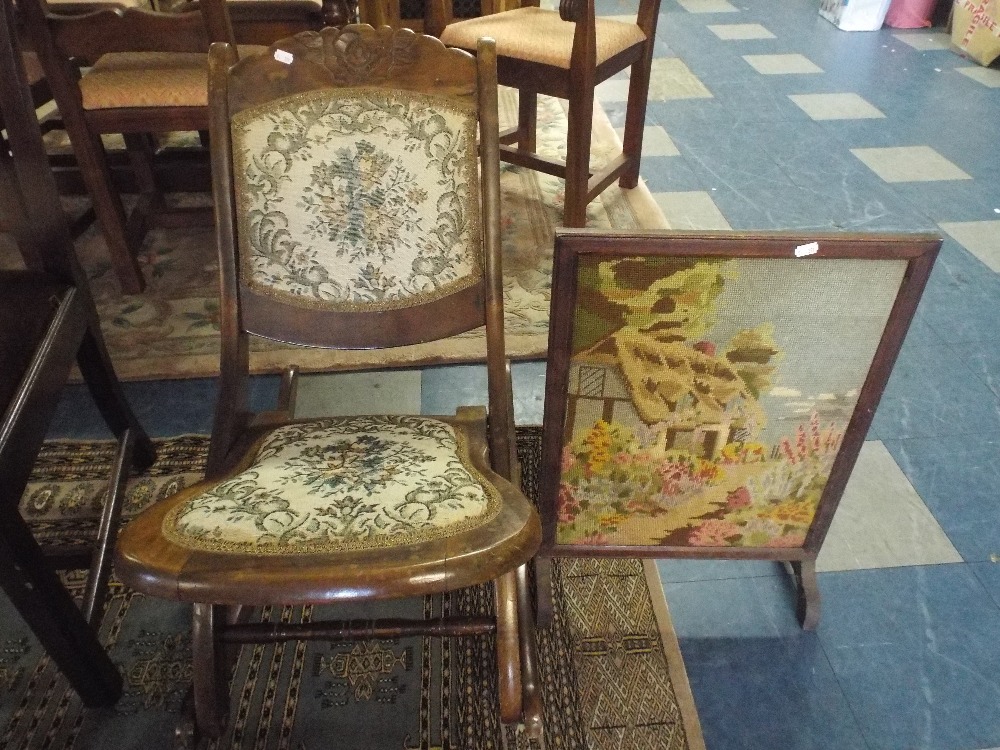 A Folding Tapestry Upholstered Rocking Chair and A Tapestry Fire Screen.