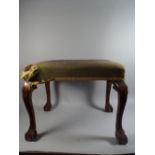 A 19th Century Rectangular Topped Stool on Carved Cabriole Mahogany Legs with Claw and Ball Feet.