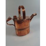 A 19th Century Copper Water Can.