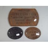 Three Cast Metal Builders Plates.