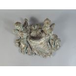 A Cast Wall Hanging Reproduction Stoup in The Form of Cherubs with Basket.
