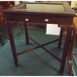 A Modern Mahogany Square Topped Bijouterie Table With Carved Supports and Cross Stretcher.