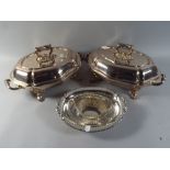 A Pair of Silver Plated Lidded Entree Dishes with Twist Off Handles Together with Two Silver Plated