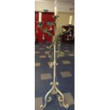 A Painted Wrought Iron and Crystal Decorated Tripod Lamp Stand with Scrolled Feet.