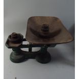 A Set of Kitchen Scales and Weights.