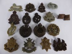 A Quanity of Original WWII Bakelite Issue Cap Badges, including Rifle Brigade, two East Surrey,