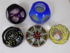 Five Glass Paperweights, including Whitefriars faceted paperweight carries a 'Monk Cane' dated 1982,