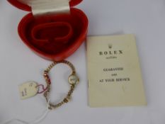 A Lady's 9ct Gold Tudor Royal Rolex Wristwatch, the watch on 9ct gold Bonklip adjustable bracelet,