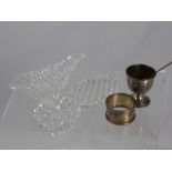 Four miscellaneous items comprising a Victorian cut glass sauce boat and saucer and a salt