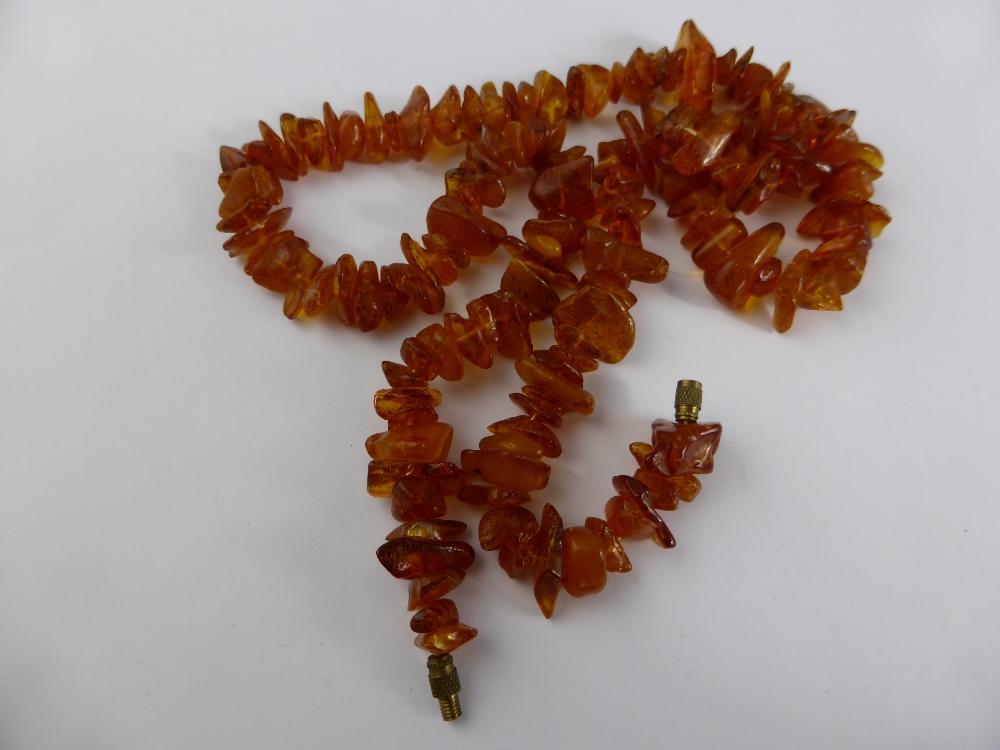 A Vintage Rough Amber Necklace, length 56 cms, wt 30 gms.