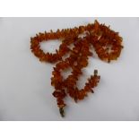 A Vintage Rough Amber Necklace, length 56 cms, wt 30 gms.