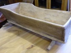 A vintage pine rocking cradle, est. 50 x 35 x 96 cms.