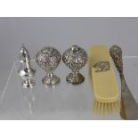 An Indian Silver Salt and Pepper, together with a silver handle shoe horn and an ivory clothes brush