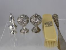 An Indian Silver Salt and Pepper, together with a silver handle shoe horn and an ivory clothes brush