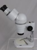 An Unboxed Chinese Binocular Microscope.