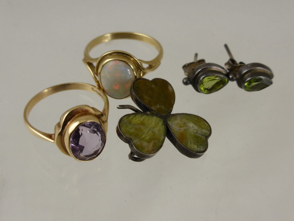 A lady's 9 ct gold amethyst ring, size N together with a lady' 9 ct opal ring, size N, green stone