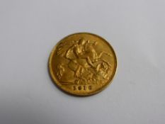 An Edward VII 1910 half sovereign (good condition)