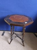 An Octagonal Side Table, with a burr walnut centre on turned legs and stretchers, the surround to