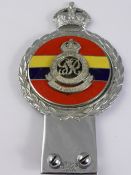 A Chrome and Enamels Royal Military Academy Sandhurst car bumper badge, the badge engraved JRG &