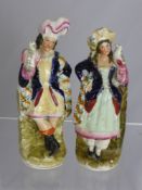 A Pair of 19th Century Staffordshire Figures, the figures wearing Highland costumes est height 23