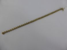 A Lady's 9 ct Gold Diamond Bracelet, the circular linked bracelet set with 38 diamonds, of 1.4 mm