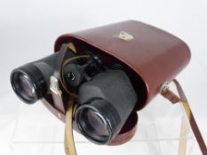 A Pair of Carl Zeiss 8 x 50 Binoculars, in the original leather case.