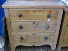 A Reclaimed Waxed Pine Chest of Drawers, the chest having three graduated drawers on bracket feet,