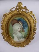 An Oval Portrait Miniature of a Lady, depicting a lady in a feather trimmed hat, the miniature in