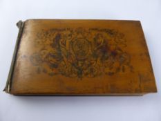 A Wooden Covered Souvenir Book of Lithographs de Fontainebleau, the book depicting various scenes