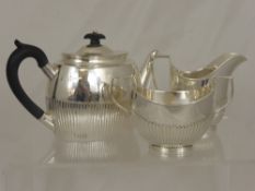 Solid Silver Bachelor Tea Trio, comprising tea pot, milk jug and sugar bowl, London hallmark, the