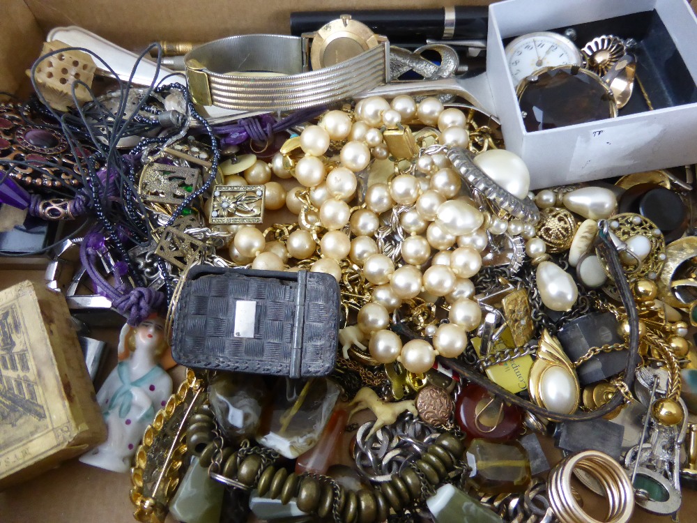 A box of costume jewellery including pens, pencils and fish servers.