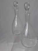 A Pair of Wine Decanters and Stoppers, each etched with Shooting and Fishing scenes, est 30 and 31