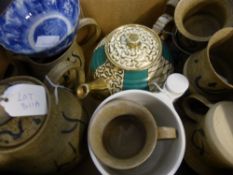 A pottery coffee set comprising coffee pot, milk jug, sugar bowl, six mugs brown ground with black