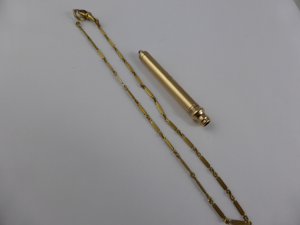 A 9 ct Gold Propelling Pencil on yellow metal chain, the pencil engraved V.S. approx wt 16 gms.